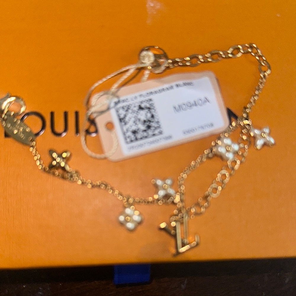 Louis Vuitton Gold and White Charm Bracelet